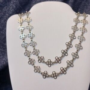 Signed Tory Burch Cross Necklace, 32 inches in length